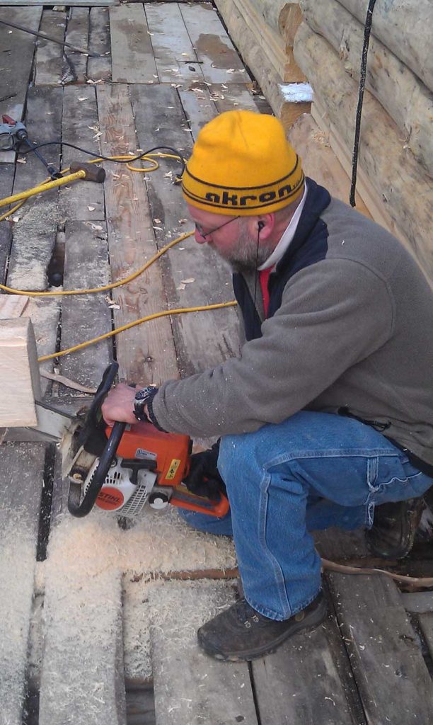 John working on timber.