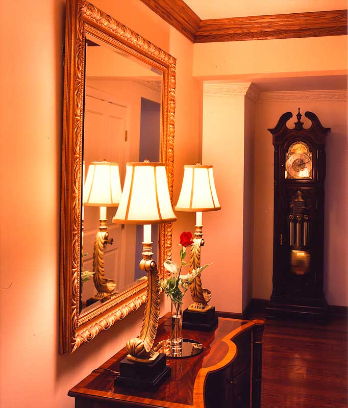 Large wall mirror in hallway.